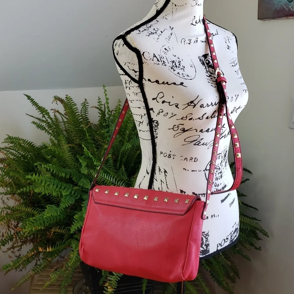 RED studded-embellished lipstick red vegan leather shoulder bag